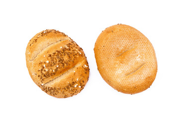 Crispy bun sprinkled with caraway isolated on white background