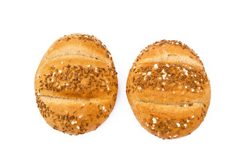 Crispy bun sprinkled with caraway isolated on white background