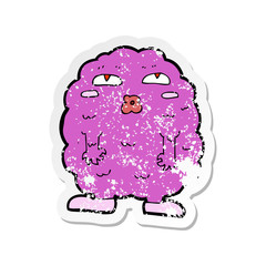 retro distressed sticker of a funny cartoon monster