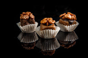 three healthy useful organic handmade candies with walnuts