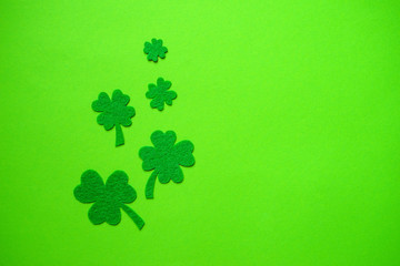Decorative leaf of clover, trefoil, shamrock leaves on green background, close up. Happy St....