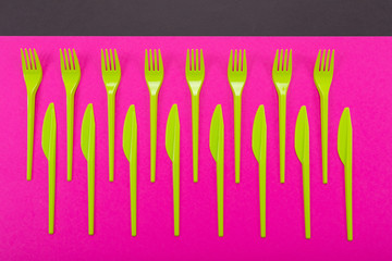 Colorful set of plastic table ware isolated on background