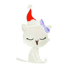 retro cartoon of a cat with bow on head wearing santa hat