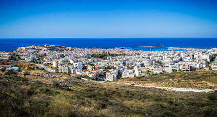 Obraz premium Panoramic view of Rethymnon and its castle and harbour in Crete, Greece