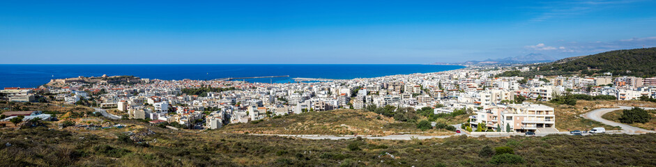 Fototapeta na wymiar Panoramic view of Rethymnon and its castle and harbour in Crete, Greece