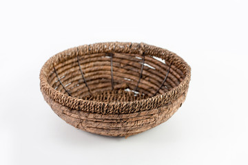 Fototapeta premium empty wicker basket isolated on white background