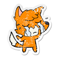 distressed sticker of a crying fox cartoon