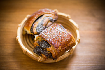 sweet homemade buns with poppy seeds in a bowl