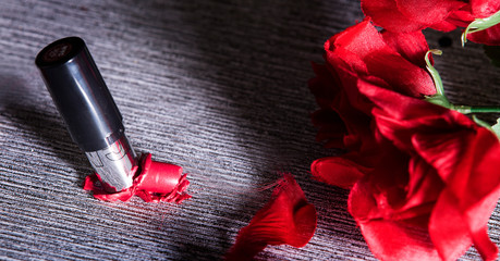 red lipstick and flower