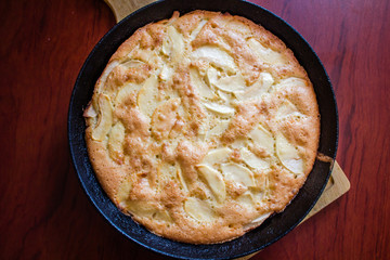 Charlotte pie pan. Apple pie. Homemade baking. Cook at home. Cast-iron pan.