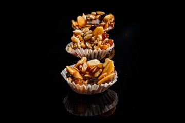 row of three of useful handmade candies with caramelized sunflower and pumpkin seeds
