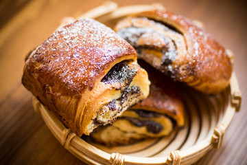 sweet homemade buns with poppy seeds in a bowl