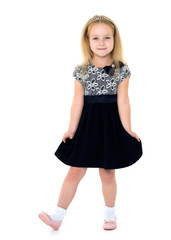 Little girl in an elegant dress.