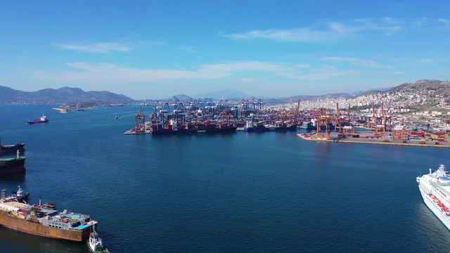 Aerial drone video of industrial container terminal in commercial port of Piraeus, Drapetsona, Attica, Greece
