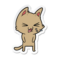 sticker of a cartoon cat hissing