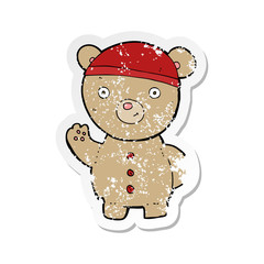 retro distressed sticker of a cartoon teddy bear