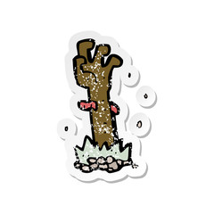 retro distressed sticker of a cartoon zombie hand