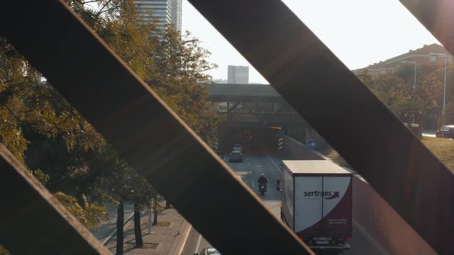 above view of car traffic on crossroad of Avinguda Diagonal in Barcelona city in evening
