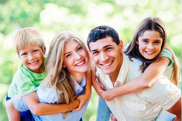 Beautiful smiling family on background