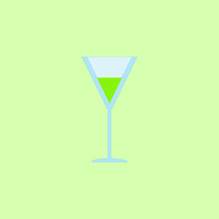 Glass of drink on the green background