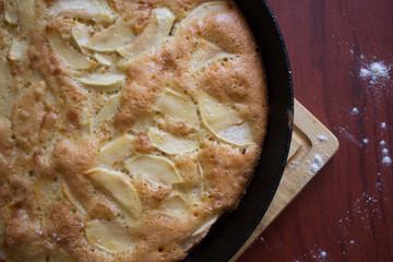 Charlotte pie pan. Apple pie. Homemade baking. Cook at home. Cast-iron pan.