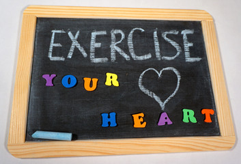 Fototapeta na wymiar Positive exercise message on chalkboard