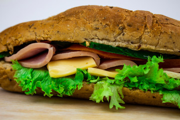 Fast food. Burger with vegetables, ham and cheese. Meat Hamburger Macro. Beef burger on a white background. space for text