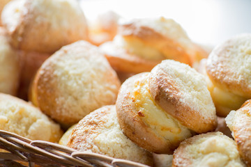 cottage cheese pastries in a basket on the bakery window.