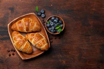Fresh croissants and berries