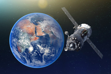 Obraz na płótnie Canvas Manned spacecraft orbiting the earth. Elements of this image furnished by NASA