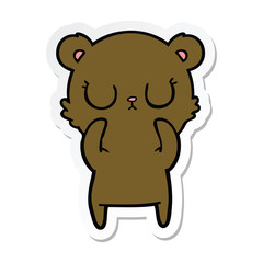 sticker of a peaceful cartoon bear