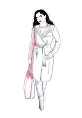 Fashion woman wearing a coat, sweater and jeans, holding a bag. Autumn feminine style wardrobe
