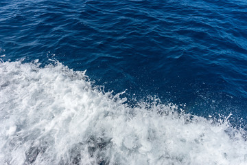 Italy,Cinque Terre,Riomaggiore,white frothing waves in the ocean