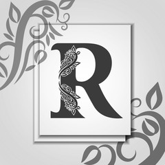 Fototapeta premium Premium letter R with Elegant floral contour for initials logo. Letter R isolated on modern card. Universal symbol template for design, business or wedding card, monogram, logotype, restaurant, cover