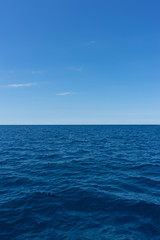 Fototapeta na wymiar Italy,Cinque Terre,Riomaggiore, a large body of water next to the ocean