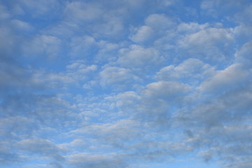 Blue sky and clouds background.