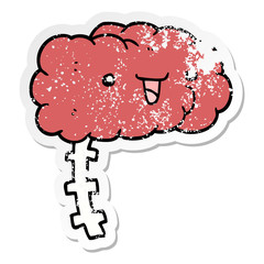distressed sticker of a happy cartoon brain