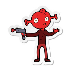 sticker of a cartoon alien with ray gun