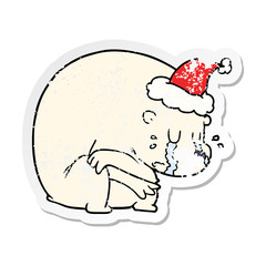 crying distressed sticker cartoon of a polar bear wearing santa hat