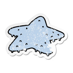 distressed sticker cartoon doodle of a star fish