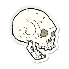 sticker of a cartoon spooky skull