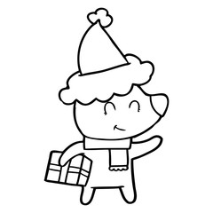 female polar bear with christmas present wearing santa hat