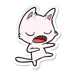 sticker of a talking cat dancing