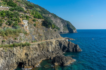 Naklejka premium Italy,Cinque Terre, Manarola, cliff over the ocean Italian Riviera