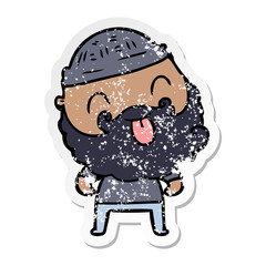 distressed sticker of a man with beard sticking out tongue