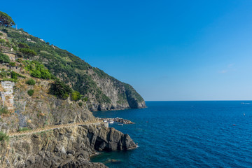 Fototapeta na wymiar Italy,Cinque Terre, Manarola, cliff over the ocean Italian Riviera