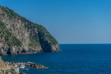 Fototapeta na wymiar Italy,Cinque Terre, Manarola, cliff over the ocean Italian Riviera