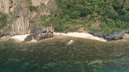 Aerial drone shot of high mountain covered with tropical forest. Tropical landscape. Travel concept Philippines,El Nido.