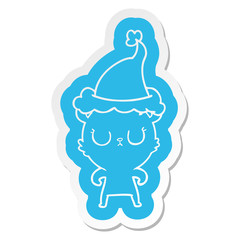 peaceful cartoon  sticker of a bear wearing santa hat