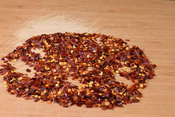 red pepper on wooden background